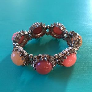 Vintage gold bracelet with peach toned stones